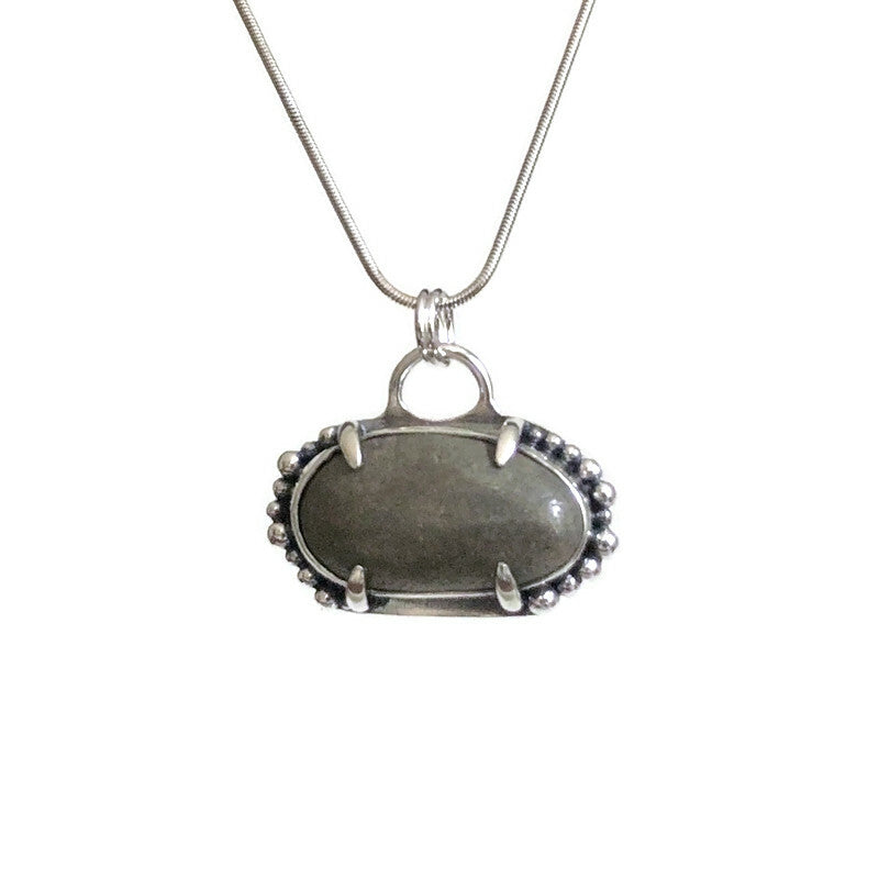 Sterling Silver and Beach Stone Pendant with Claw Setting