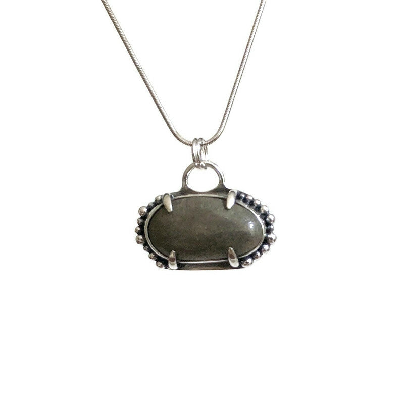 Sterling Silver and Beach Stone Pendant with Claw Setting