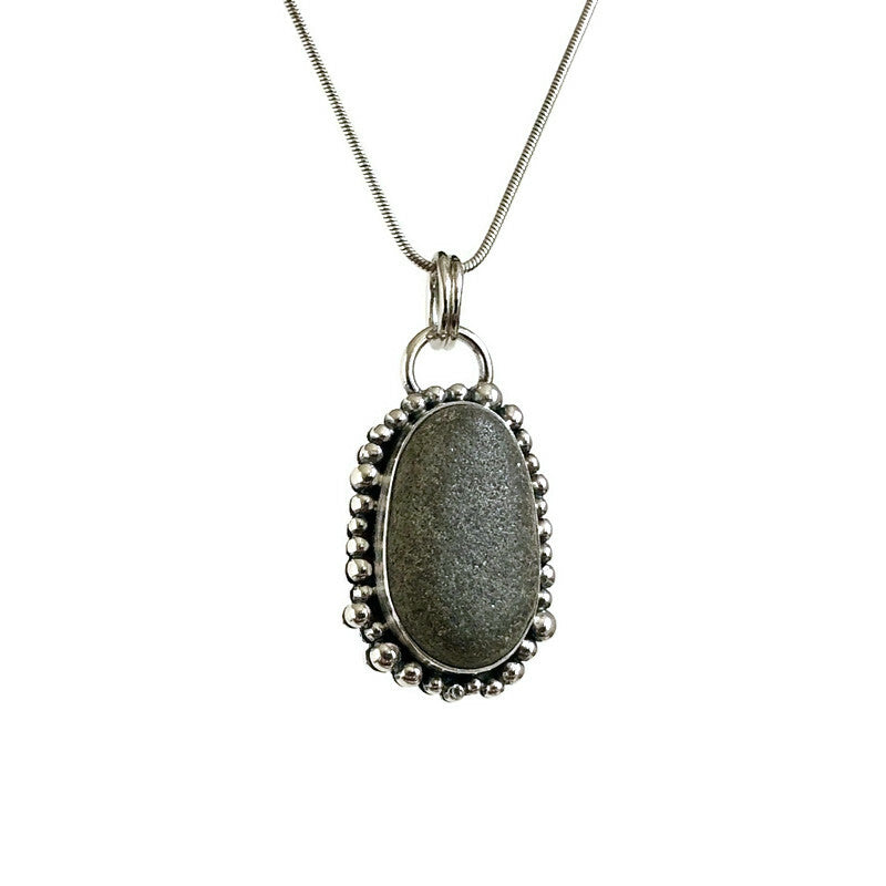 Sterling Silver and Oval Beach Stone Pendant with Small Granulation